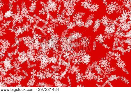 Red Snowflake Pattern With Falling Snowflakes Background