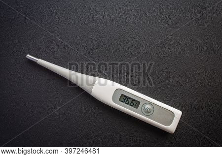 Picture Of A Thermometer On A Dark Background
