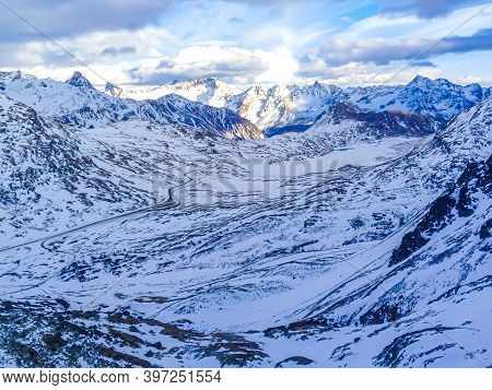 Swiss Alps Snow Covered Mountain Summits With Glacier Morteratsch Switzerland In Foreground