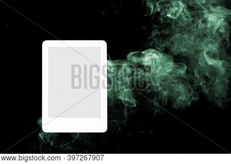 E-book With Black Background And Smoke