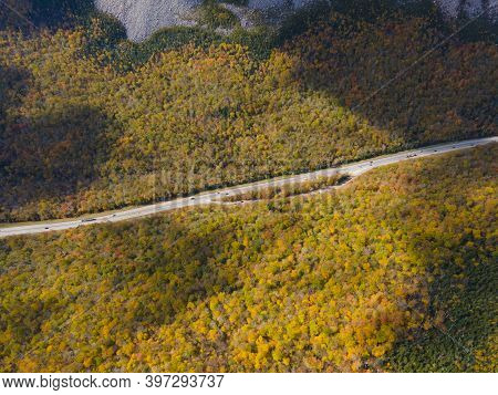 Interstate Highway I-93 With Fall Foliage Aerial View In Franconia Notch State Park In White Mountai
