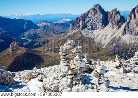 Commemorative stone pyramid. South Tyrol. Italy. Pordoi is a mountain pass of the Dolomites. The Passo-Pordoi pass separates the province of Trento from the province of Belluno.