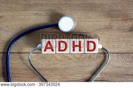Adhd Symbol. Concept Word 'adhd, Attention Deficit Hyperactivity Disorder' On Cubes On A Beautiful W