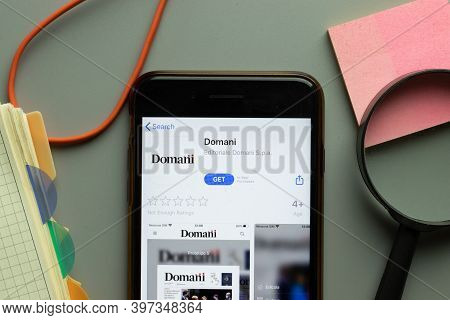New York, Usa - 1 December 2020: Domani Mobile App Icon On Phone Screen Top View, Illustrative Edito