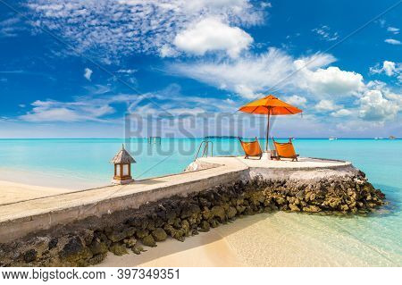 Sun Bed And Parasol (umbrella) At Tropical Paradise Ocean Beach In A Sunny Summer Day