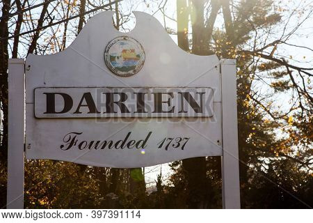 DARIEN,CT, USA-NOVEMBER 29 2020:  Darien town sign near Post road on border line with Stamford