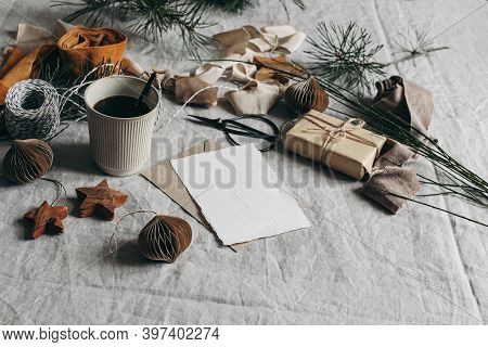 Christmas Atill Life. Greeting Card Mockup. Paper Christmas Ornaments, Cup Of Coffee And Gift Box. V