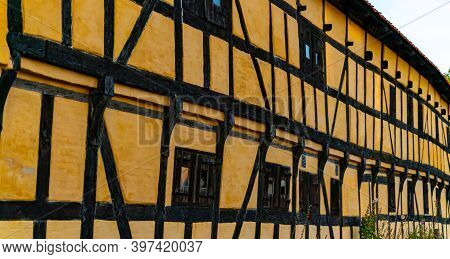 Facade Of An Old Half Timbered Medieval House In Northern Europe.