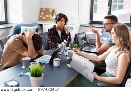 business, people and failure concept - team of startuppers meeting at office