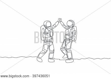 Single Continuous Line Drawing Of Two Young Astronauts Giving High Five Gesture To Celebrate A Succe