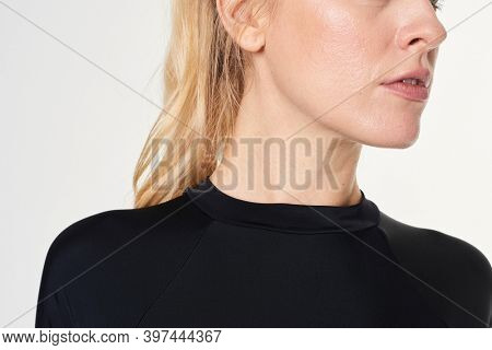 Blonde woman in a black swimsuit mockup