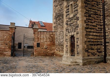 Medieval Stone St. Bartholomew´s Church In Autumn Day, Arched Windows, Chimeras And Gargoyles, Gothi