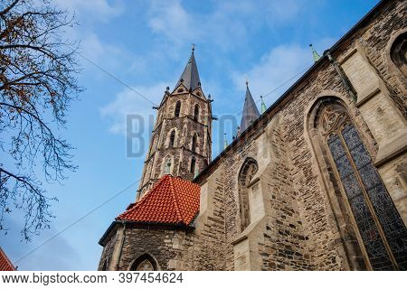 Medieval Stone St. Bartholomew´s Church In Autumn Day, Arched Windows, Chimeras And Gargoyles, Gothi