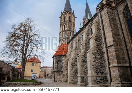 Medieval Stone St. Bartholomew´s Church In Autumn Day, Arched Windows, Chimeras And Gargoyles, Gothi