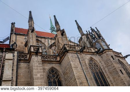 Low Angle View At A Part Of Medieval Stone St. Bartholomew´s Church In Autumn Day, Arched Windows, C