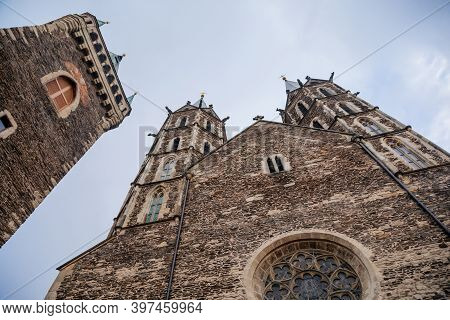 Medieval Stone St. Bartholomew´s Church In Autumn Day, Arched Windows, Chimeras And Gargoyles, Gothi