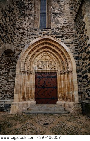 Gothic Portal Of Medieval Stone St. Bartholomew´s Church, Architectural Element Of Facade, Decorativ