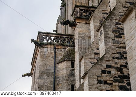 Low Angle View At A Part Of Medieval Stone St. Bartholomew´s Church In Autumn Day, Arched Windows, C
