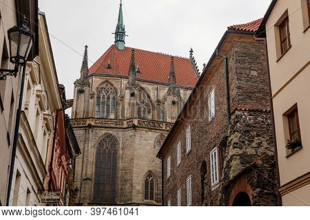 Medieval Stone St. Bartholomew´s Church, Gothic Cathedral At The End Of Narrow Street In Autumn Day,