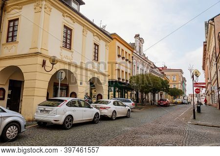Narrow Picturesque Street With Colorful Buildings In Old Historic Center In Kolin, Baroque House Wit