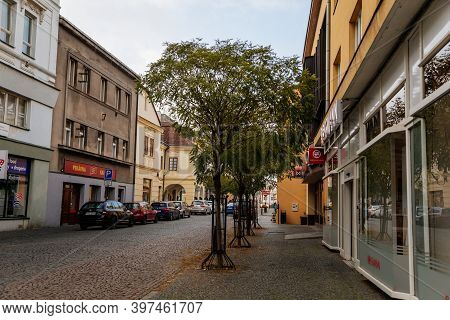 Narrow Picturesque Street With Colorful Buildings In Old Historic Center In Kolin, Central Bohemia, 