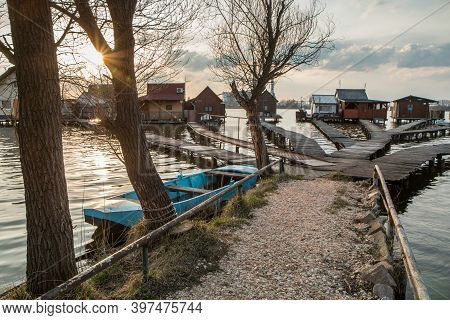 A Picture From Hungary, From A Place Called Bokod. The Local People Have The Wooden Cottages On Pylo