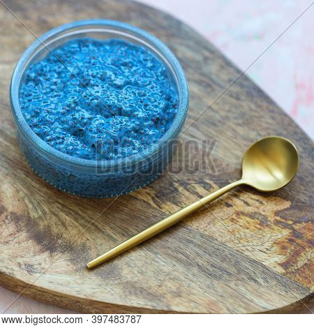 Blue Spirulina Or Butterfly Pea Flower Blue Matcha Powder Chia Seed Pudding Bowl And Golden Spoon. S