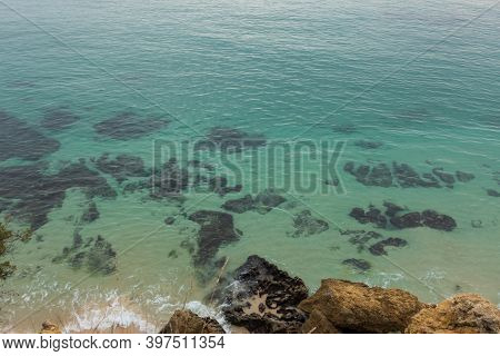 Paradise Turquoise Green Calm Transparent Water With Rocks