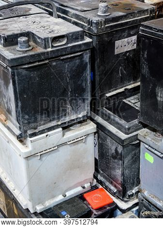A Pallet With Used Car Batteries Awaiting Recycling