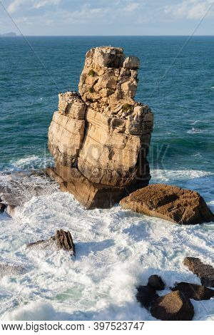 Peniche Sea Cliffs With Berlengas Island On The Background With Atlantic Ocean, In Portugal