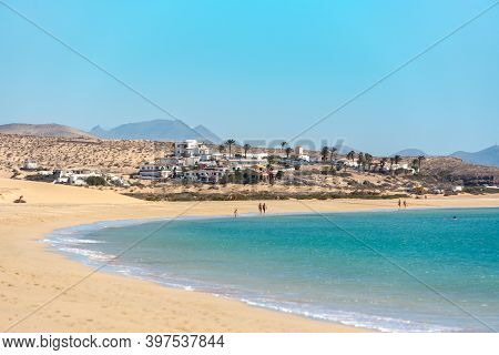 Sotavento, Fuerteventura, Spain: 2020 October 8: Young Blonde Woman Walks Through The Dunes At Playa