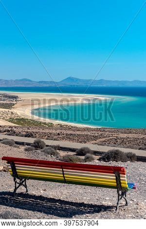 Colorful Bench To Contemplate View In Playa De Sotavento, Fuerteventura In Spain In Summer.