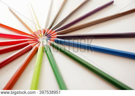 Colorful Wooden Pencils, Isolated On White Background In The Shape Of A Circle