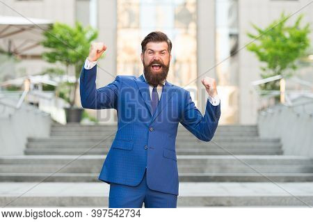 Got The Winning Bid. Happy Businessman Celebrate With Winning Gesture Outdoors. Successful Bidder. W