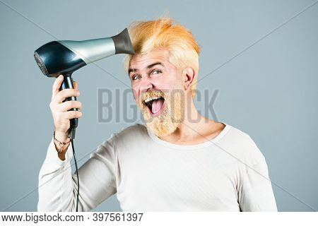 Blow-dry Your Hair. Bearded Fun Young Man Hold Blow Dry Hair Isolated On Gray Background, Studio Por