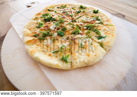 Close Up Pile Of Caucasian Khychin Bread Pie With Stuffing.