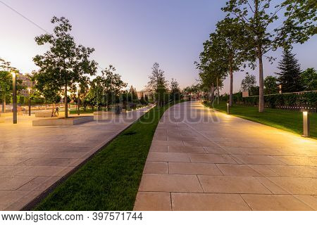 Maple Alley In French Garden In Public Landscape City Park Krasnodar Or Galitsky Park . Wooden Circu