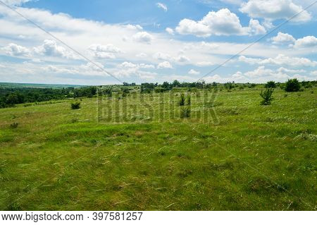 Beautiful Colorful Steppe In The Summer Season. The Stipa And Others Spring Grasses In The Warm Spri