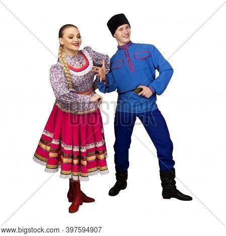 Beautiful Caucasian Cuple Dancing In Russian Folk Costumes Isolated On White Background. Full Length
