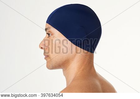Man wearing a navy blue swimming cap mockup