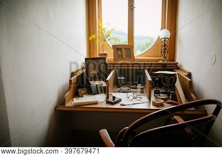 Radun Castle Interior, Neo-classical Chateau, Desk By The Window, Lamp And Old Photographs, Papers A