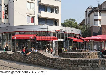 Witten, Germany - September 16, 2020: People Visit Cafe Extrablatt In Downtown Witten, Germany. Cafe