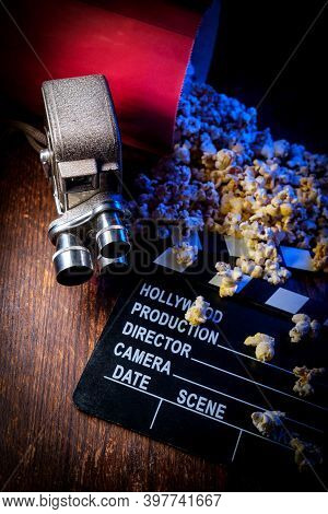 Movie Theater Popcorn With Butter And Blue Backlighting