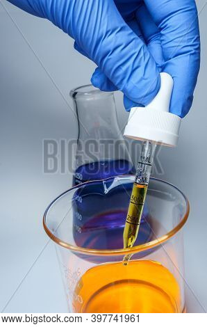 Close Up Glass Measuring Beaker For Science Experiment Background
