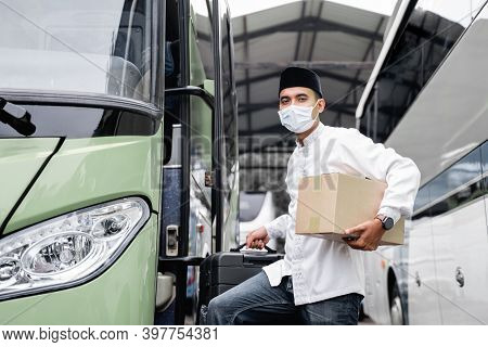 Male Muslim Travel By Bus During Pandemic