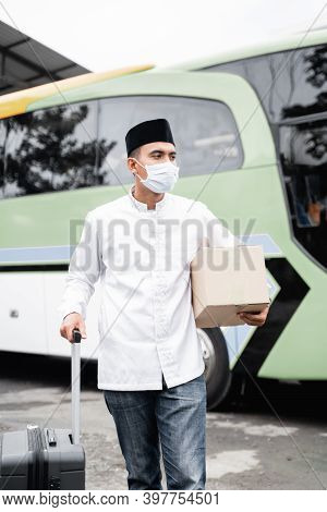 Male Muslim Travel By Bus During Pandemic