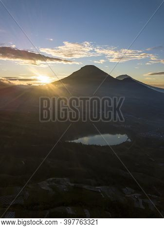 aerial view the beauty of Menjer Lake against the background of Mount Sindoro. tourist destination '