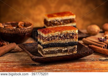 Layered Piece Of Cake, Three Layers Of Different Fillings Between Four Sheets Of Pastry