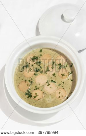 German Traditional Kartoffelsuppe Potato And Sausage Soup On White Tabel Background