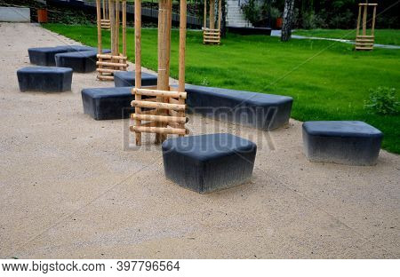 Gray Monolithic Concrete Park Bench Made Of Concrete In The Shape Of Round Stones Anthracite Color P